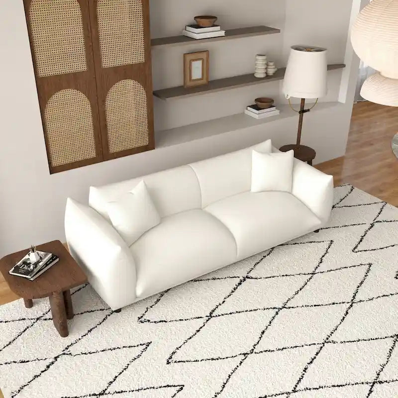 Sofá Mansan de lujo moderno de mediados de siglo con respaldo de almohada apretada y tapizado en bouclé francés color crema