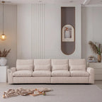Sofá seccional reversible de chenilla en forma de L de color beige con otomana, puertos USB y portavasos
