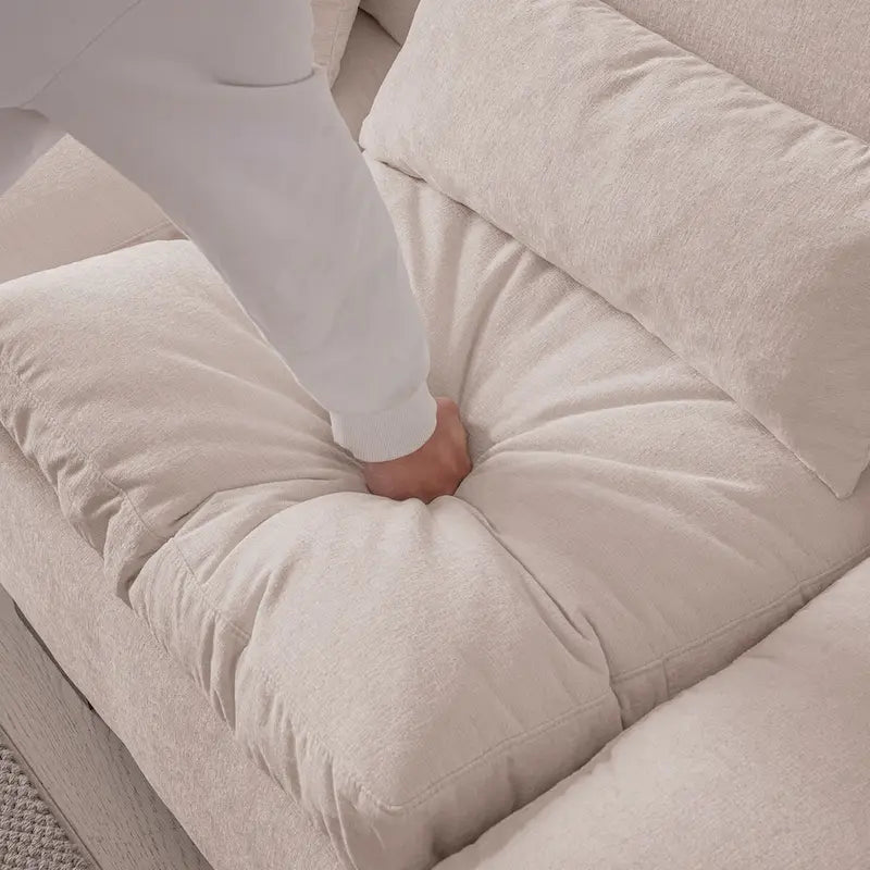 Sofá seccional reversible de chenilla en forma de L de color beige con otomana, puertos USB y portavasos